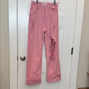 Vibrant Pink Flare Jeans with Distressed Details